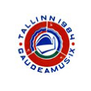 Gaudeamus IX Tallinna–Tartu 1984 logotips — apaļa krāsaina emblēma ar zili sarkanu apli, centrā attēlota atvērta grāmata, apkārt uzraksts ‘Tallinn–Tartu Gaudeamus IX